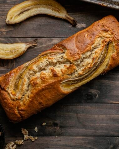 Gluten Free Banana Bread slice on wooden board